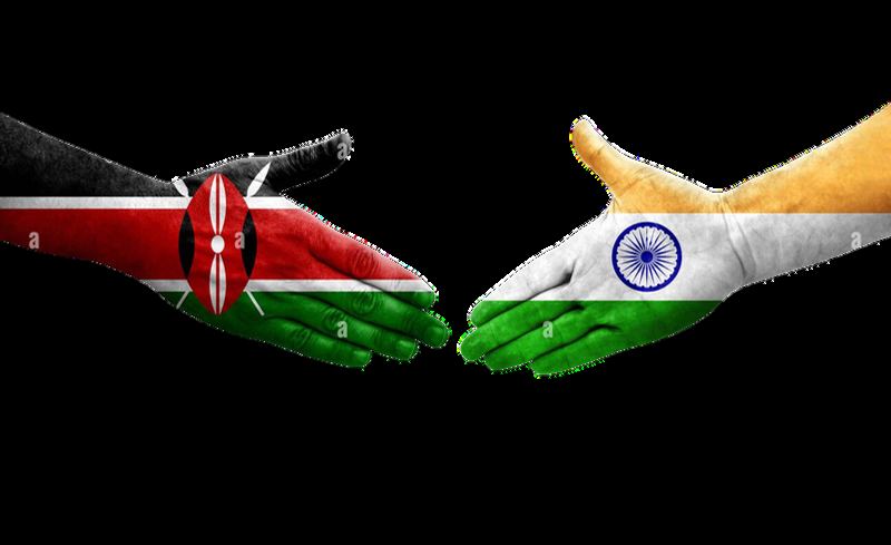 Hands painted with the Kenyan and Indian flags about to shake